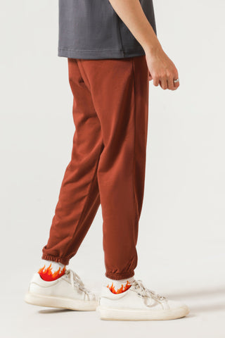Relaxed-Fit Cotton Joggers in Burnt Red