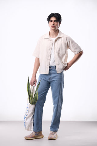 Relaxed - Fit Denim Jean in Light Wash - AttirJEAN